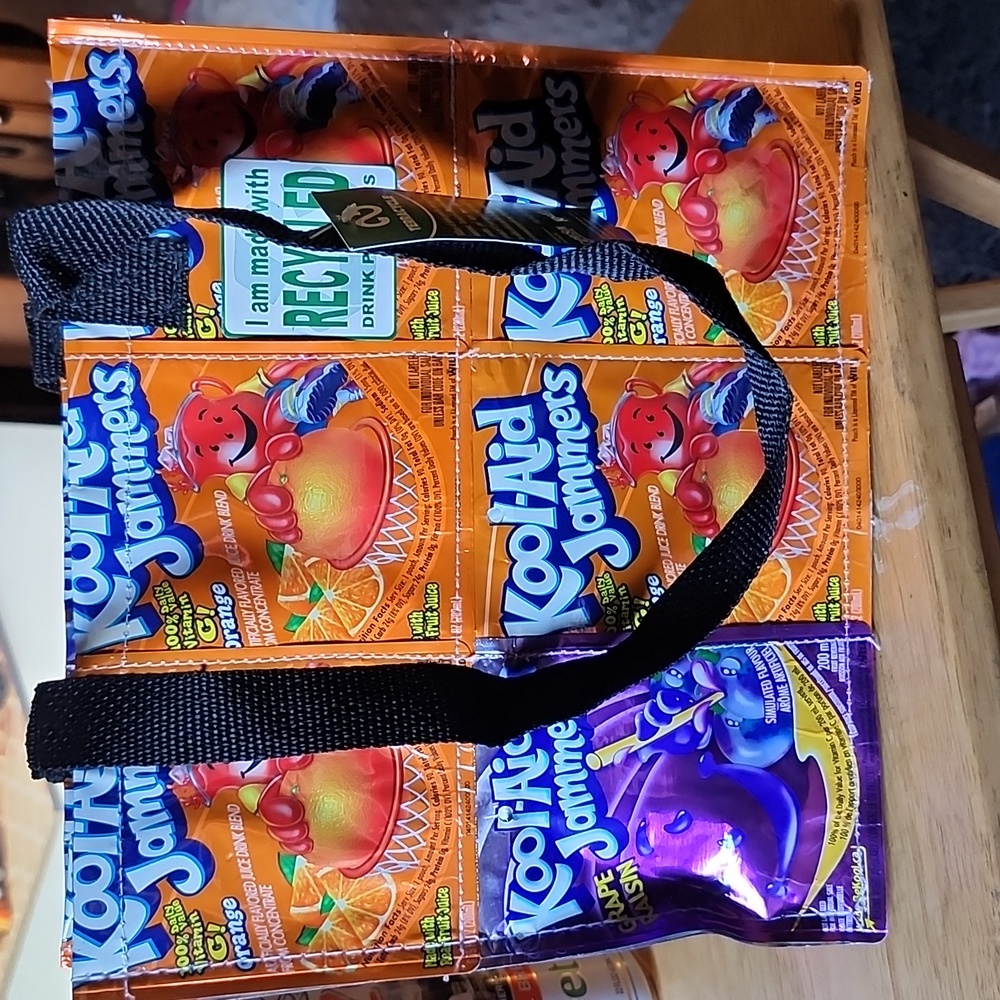 Purse recycled from kool-aid jammers